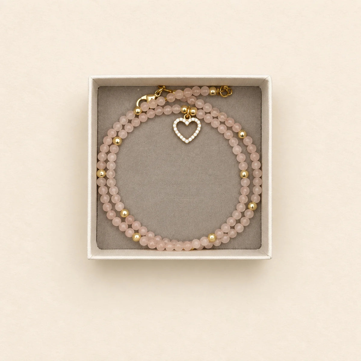 Pulsera multicolor con medalla
