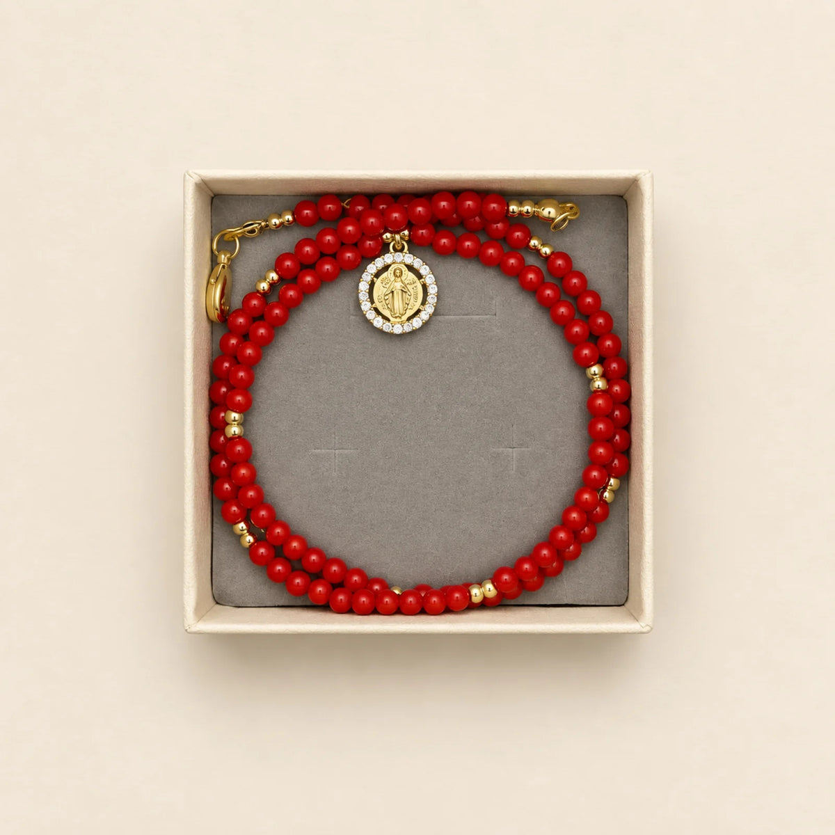 Pulsera roja con dije