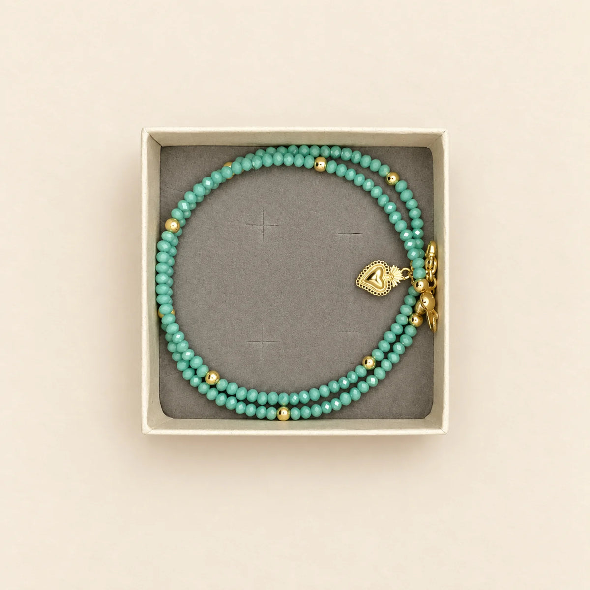 Pulsera turquesa con dije