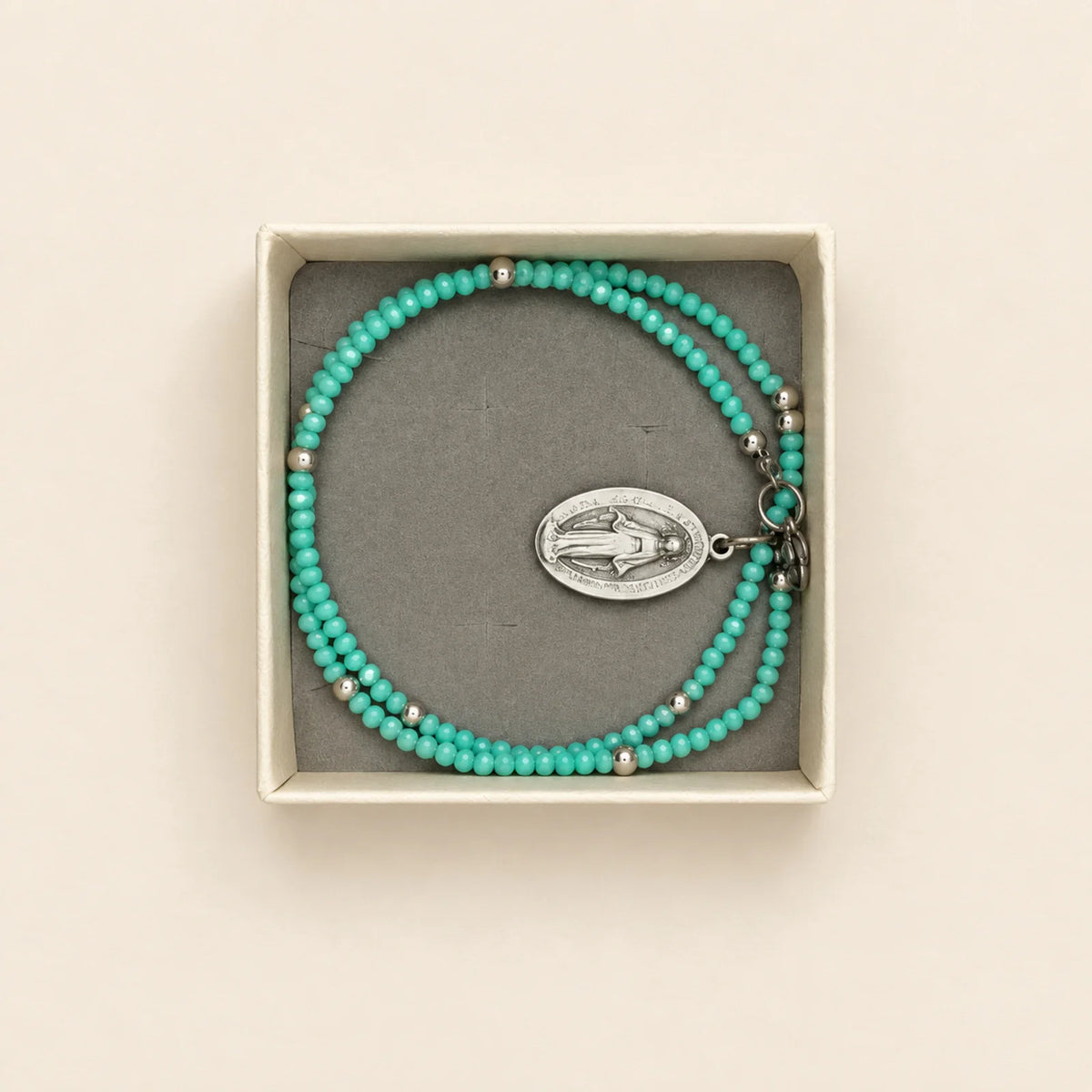Pulsera turquesa con medalla oval