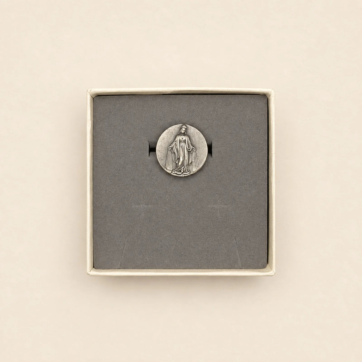 Medalla religiosa en estuche